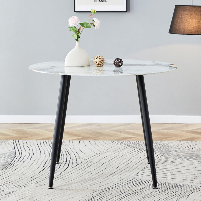 A modern minimalist circular dining table with a diameter of 40 inches, a 0.3 inch thick imitation marble pattern tabletop and black metal legs 40 '* 40' * 30 'DT-1164