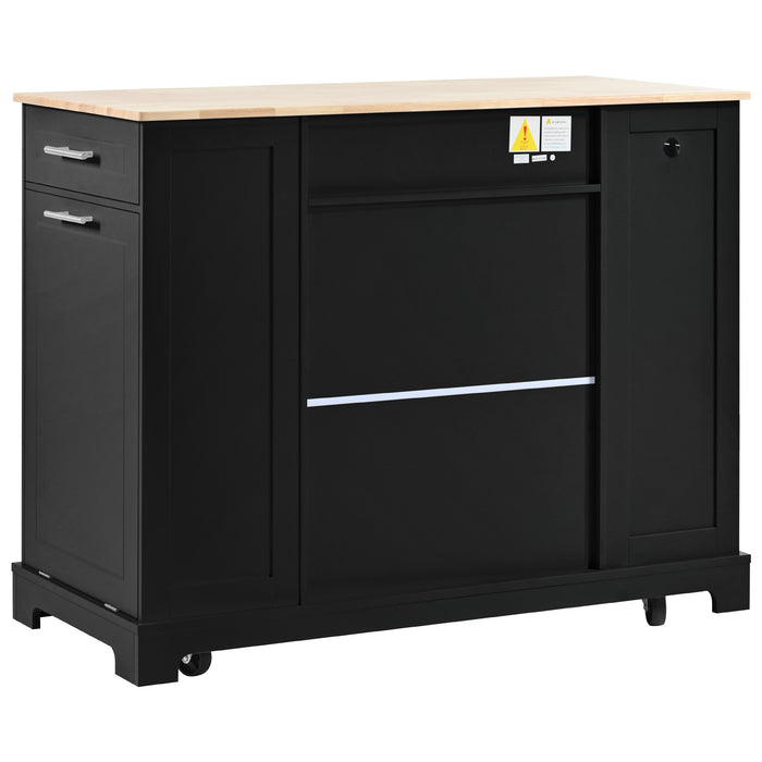 Fluted Kitchen Island with Trash Can Storage Cabinet, Power Outlet, Internal Storage Rack, Rolling Kitchen Islands on 5 Wheels with 3 Drawer, 3 Open Side Racks for 10 Gallon Garbage Bin, Black - DTYStore