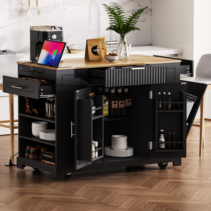 Fluted Kitchen Island with Trash Can Storage Cabinet, Power Outlet, Internal Storage Rack, Rolling Kitchen Islands on 5 Wheels with 3 Drawer, 3 Open Side Racks for 10 Gallon Garbage Bin, Black - DTYStore